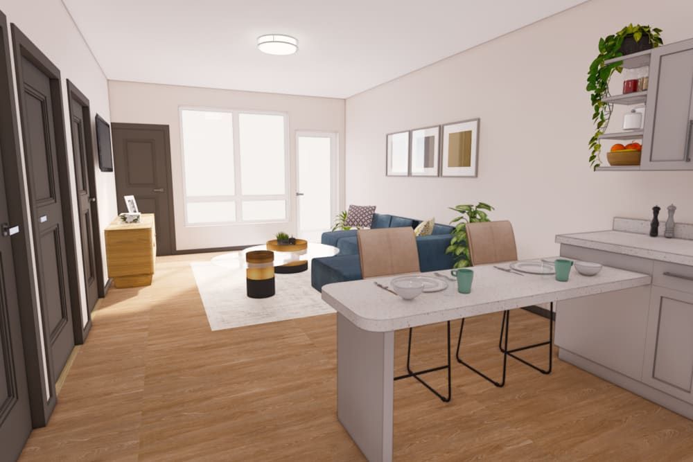 A modern, open-concept living and dining area with stylish furnishings and natural light.
