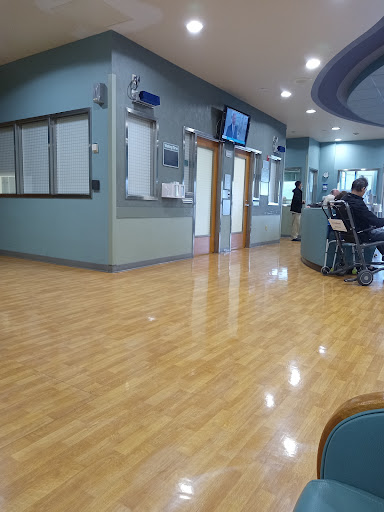 A view of a clean and spacious hospital waiting room.