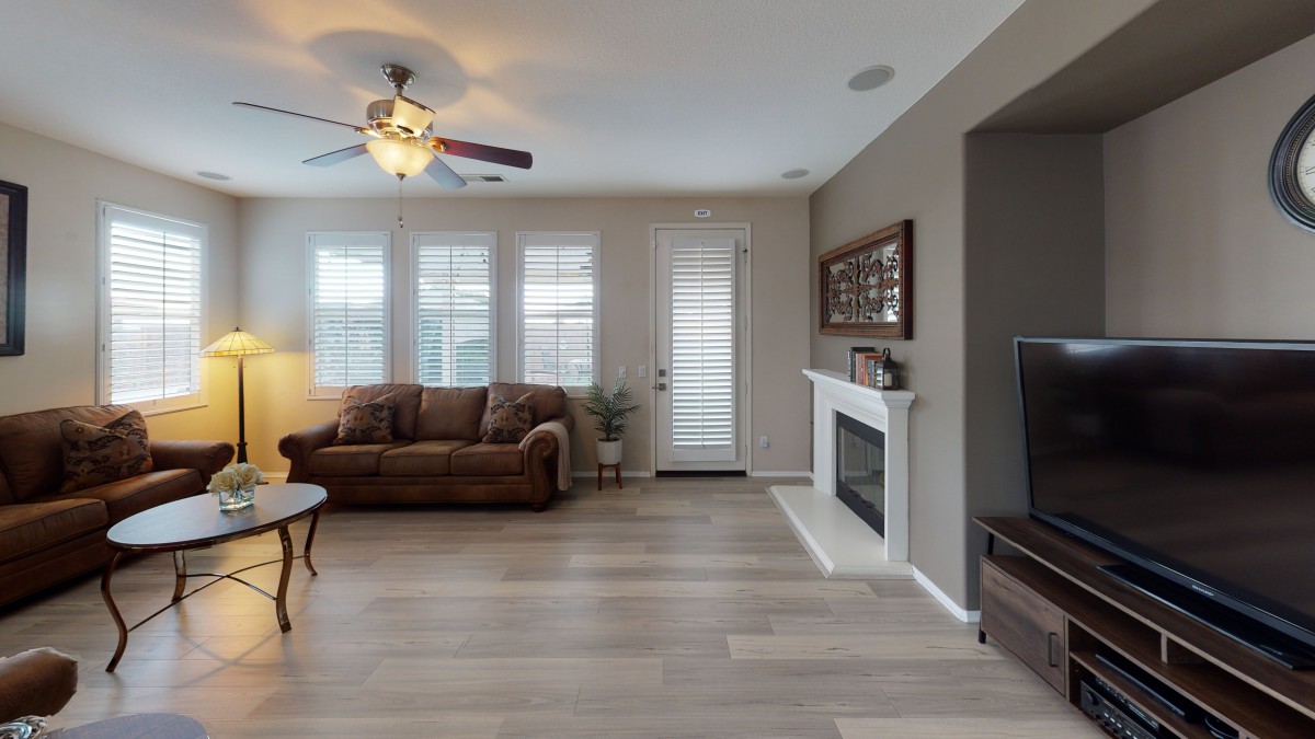 Cozy living room with a fireplace and comfortable seating.