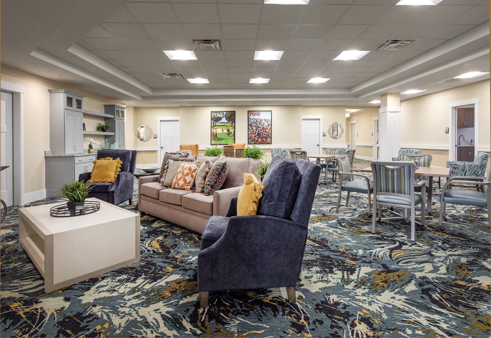 A modern living room with comfortable seating and stylish decor.