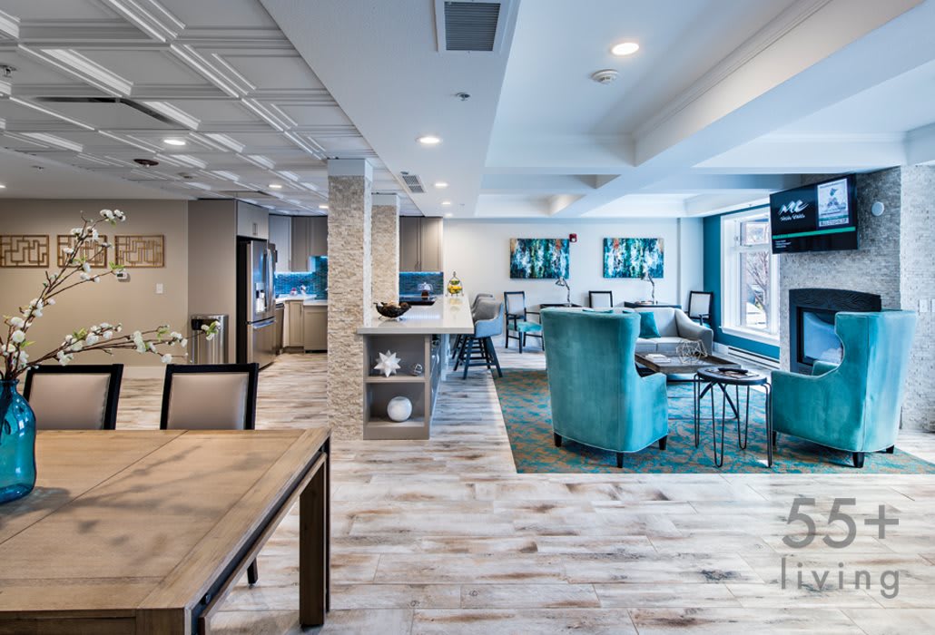 A modern and inviting lounge area with comfortable seating and bright lighting.
