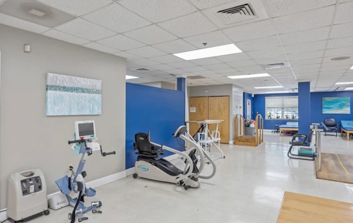 A rehabilitation center featuring exercise equipment and therapy rooms.