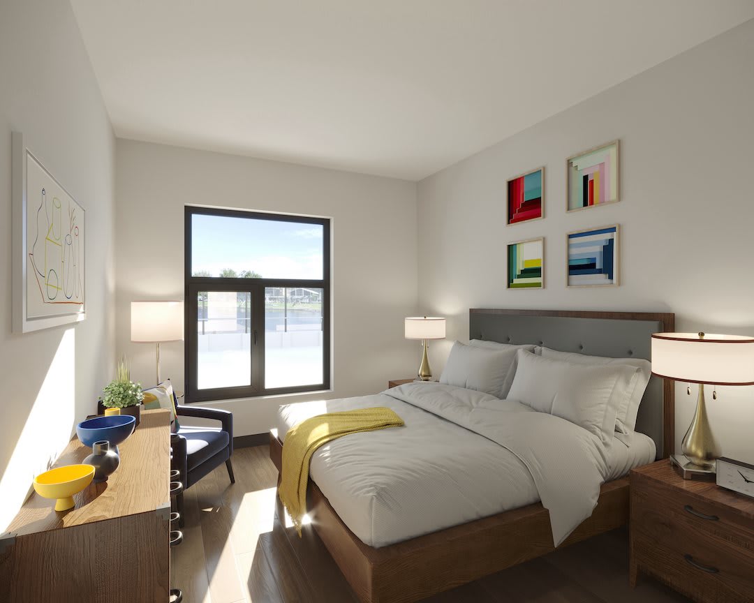 A modern bedroom with neutral tones and colorful artwork on the wall.