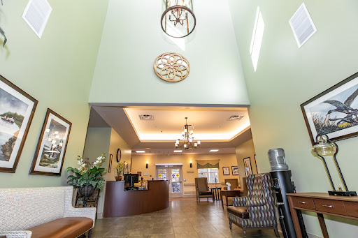 A spacious and inviting lobby with elegant lighting and comfortable seating.