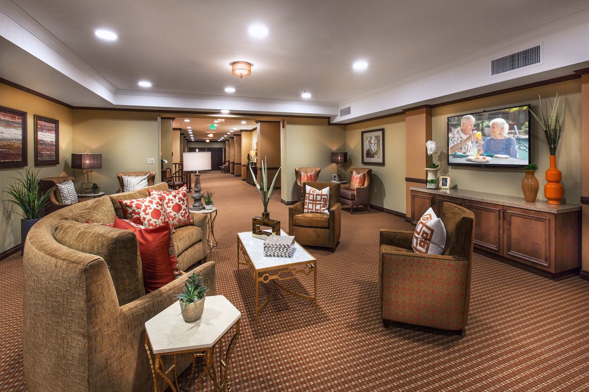 A cozy living room with comfortable seating and modern decor.
