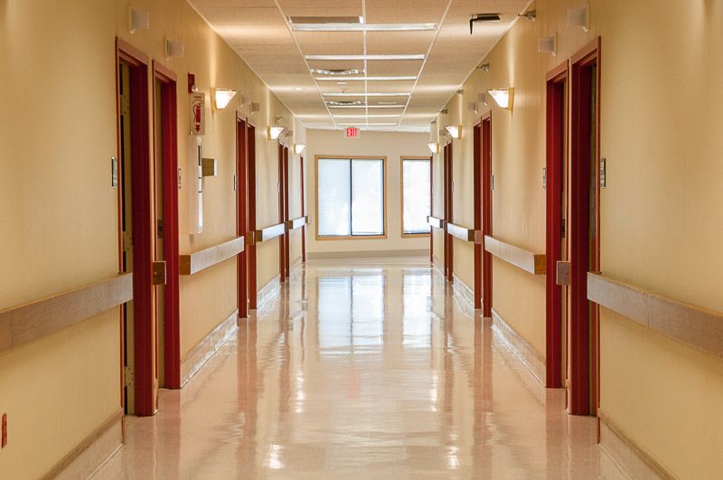 A clean and well-lit hospital hallway.