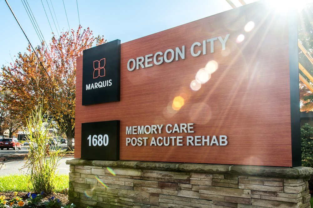 A sign for the Marquis healthcare facility in Oregon City.
