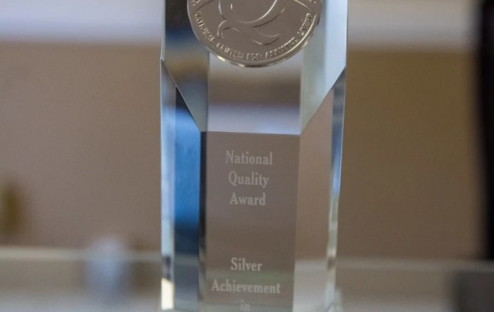 A glass trophy representing a National Cycling Award for Silver Achievement.