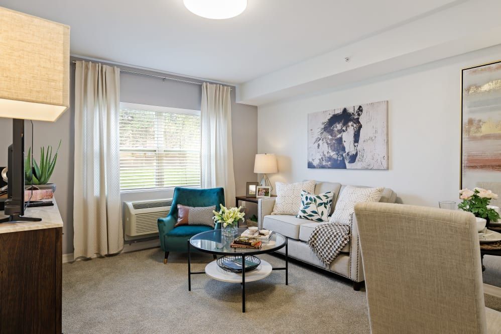 A modern and cozy living room with stylish furniture and decor.