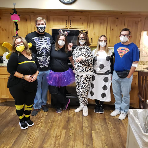 A fun group celebrating Halloween with creative costumes!