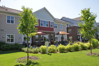 A beautiful residential complex featuring modern architecture and well-maintained landscaping.