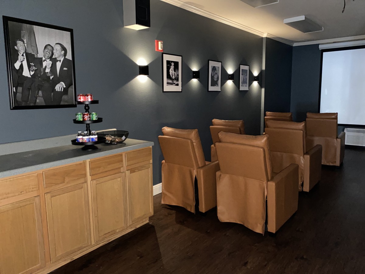 A modern home theater with comfortable seating and stylish decor.