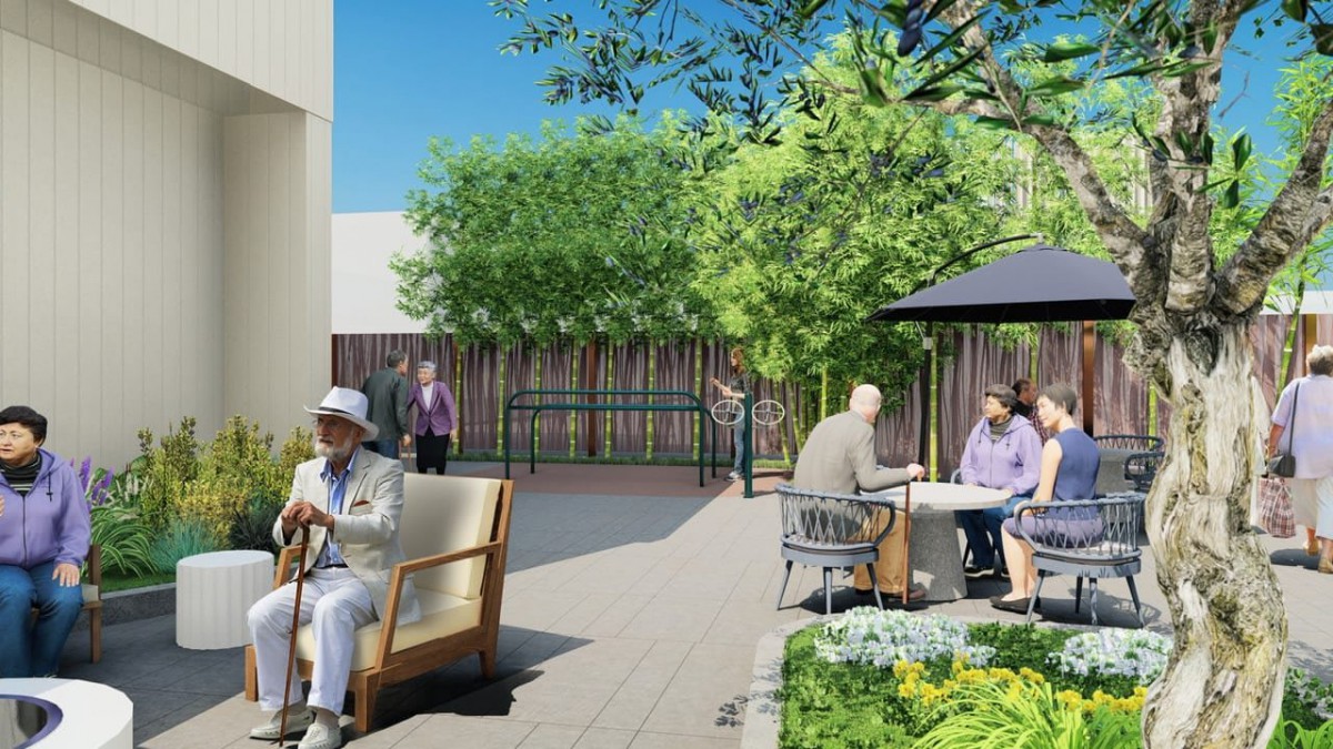 People enjoying a relaxing day in an outdoor garden patio.