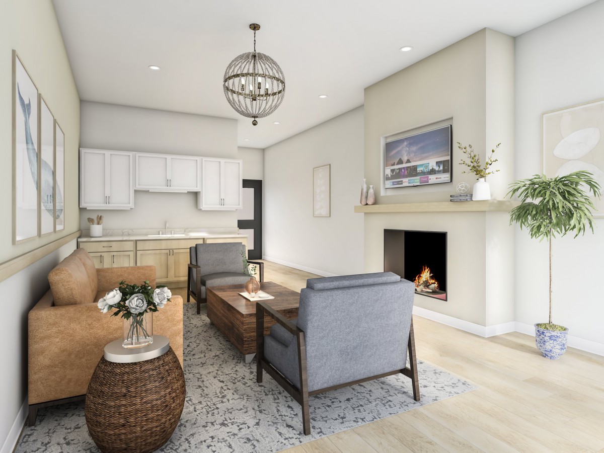 A modern and cozy living room with an open kitchen, featuring a warm fireplace and stylish furniture.