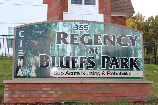Sign indicating the location of Regency at Bluffs Park, a sub-acute nursing and rehabilitation facility.