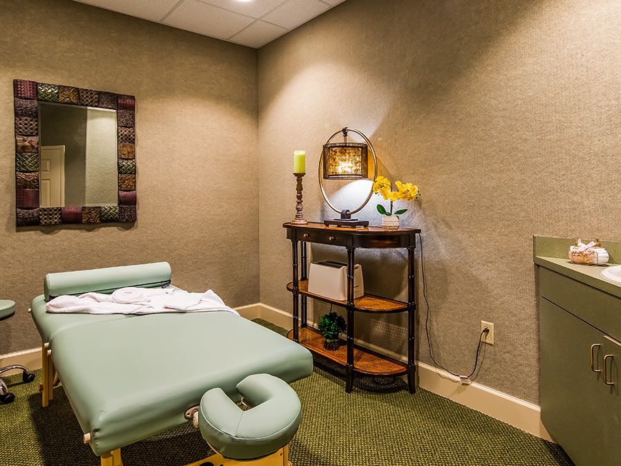 A peaceful massage room with a soft, inviting atmosphere.