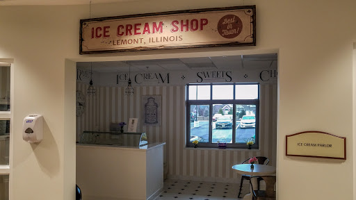 A cozy ice cream shop in LeRoy, Illinois, featuring a charming interior with a welcoming ambiance.