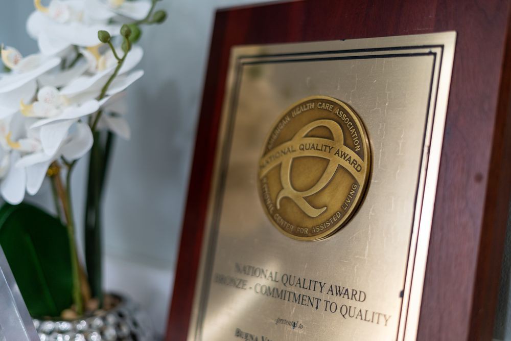 A plaque displaying an award for excellence in quality, symbolizing recognition and achievement.