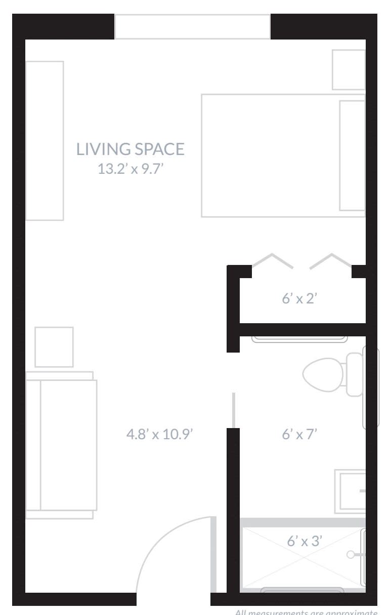 A floor plan showing a compact living space with designated areas for a bathroom, living area, and potential kitchenette.