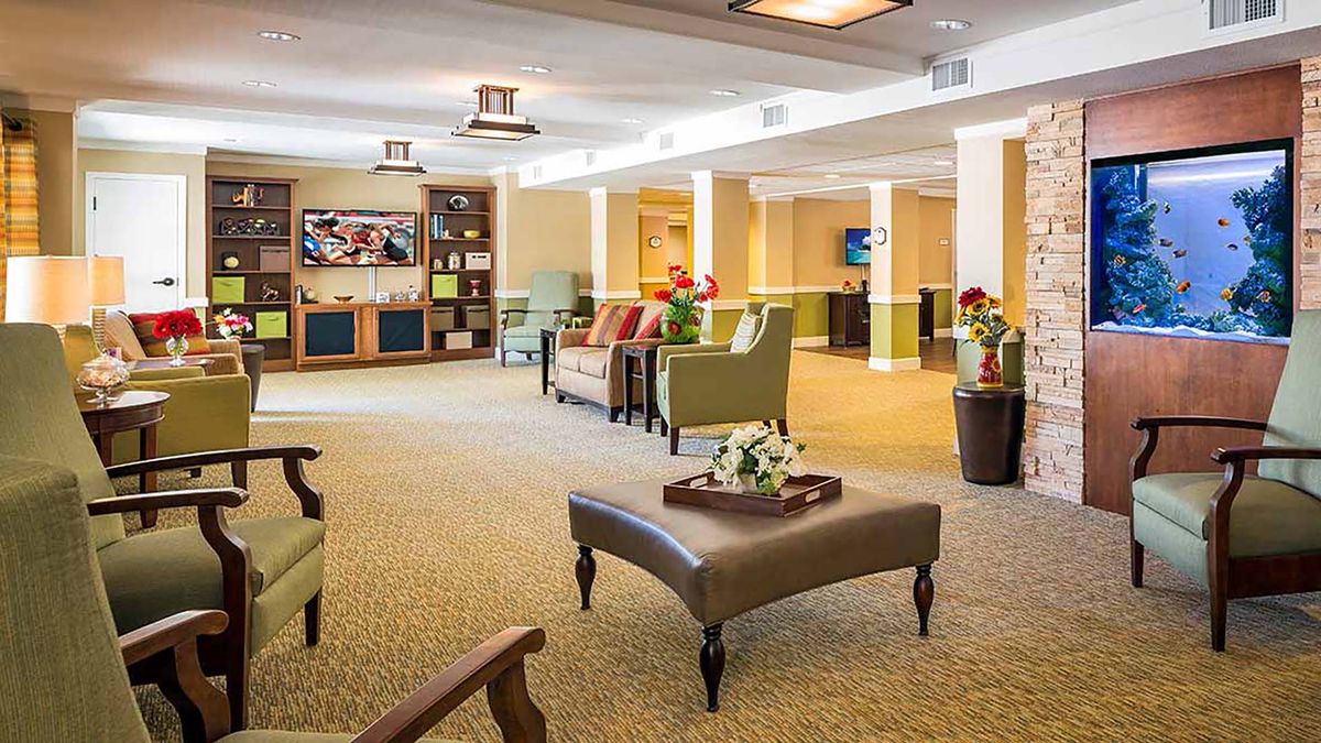 A spacious and modern lounge with comfortable seating and elegant decor.