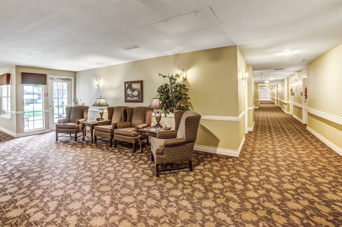 A cozy lobby area with comfortable seating and decorative elements.