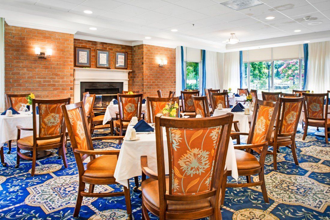 A well-decorated restaurant dining room with elegant furniture.