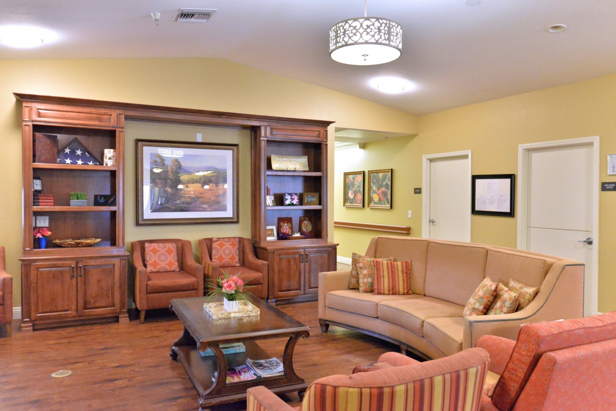 A cozy living room with comfortable seating and elegant decor.