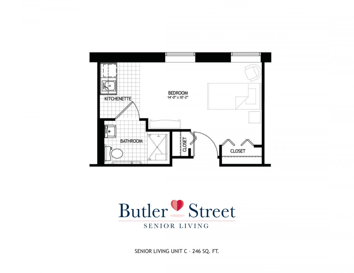 Floor plan of a studio apartment with labeled areas for living, kitchen, and bathroom.