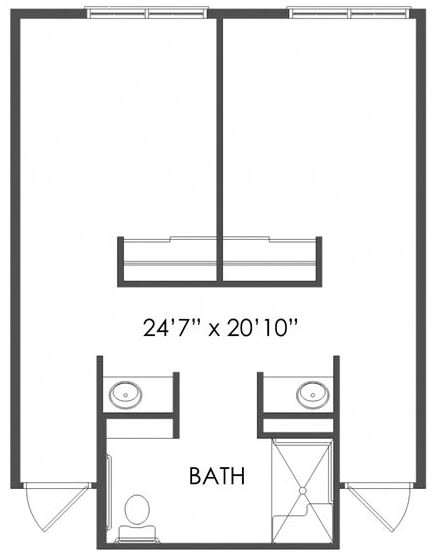 A simple floor plan showing a bedroom with dimensions and an attached bathroom.