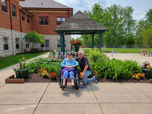 A joyful moment shared in the garden, celebrating companionship and support.