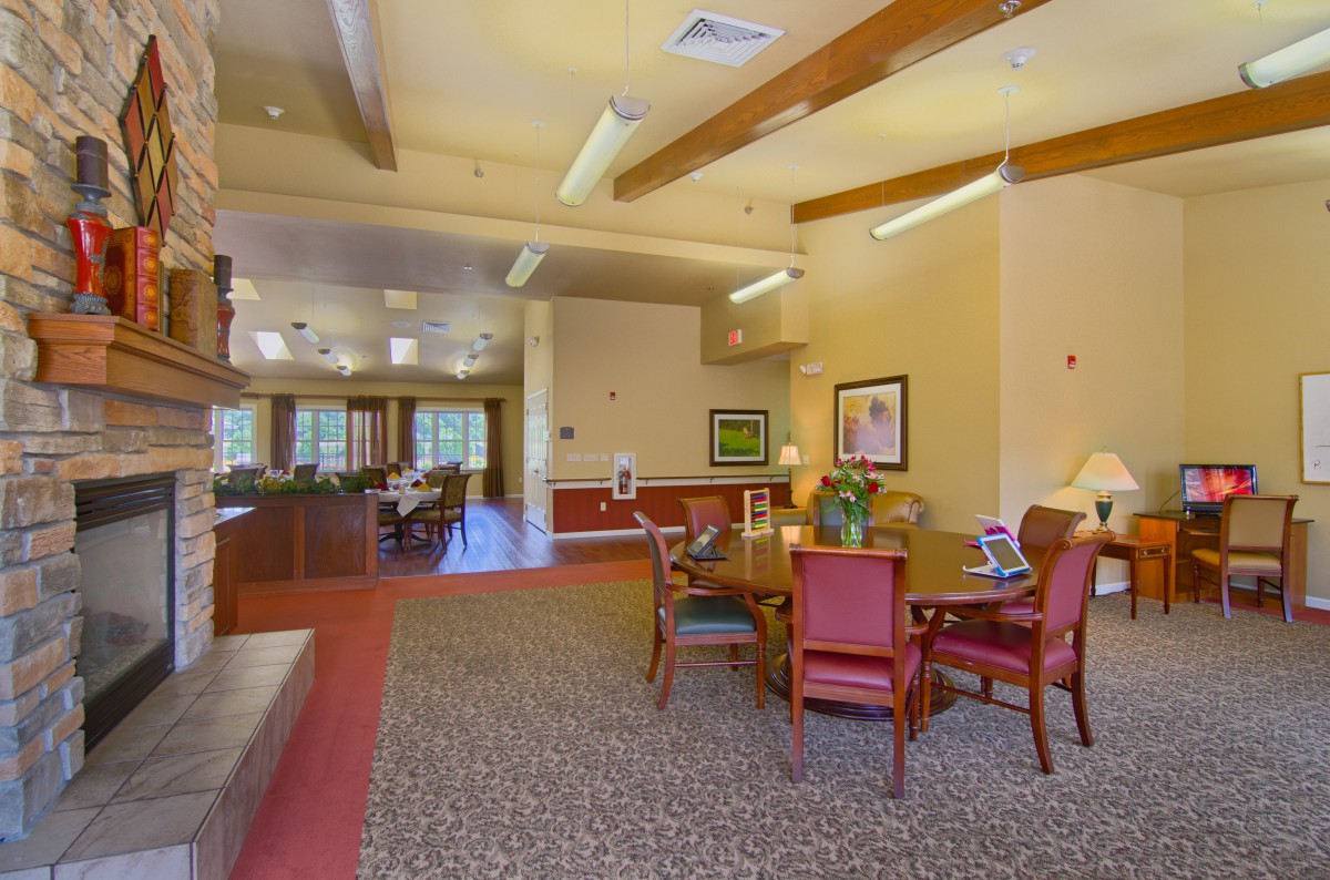 A cozy lounge area with comfortable seating and warm lighting.