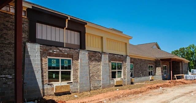 A newly constructed residential building with a modern architectural design.