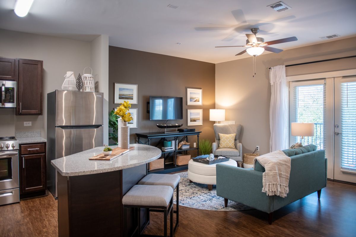 A cozy and modern living room with stylish decor and comfortable furnishings.