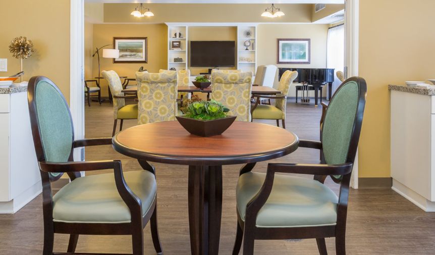 A cozy and elegantly furnished dining area with a focus on relaxation and comfort.