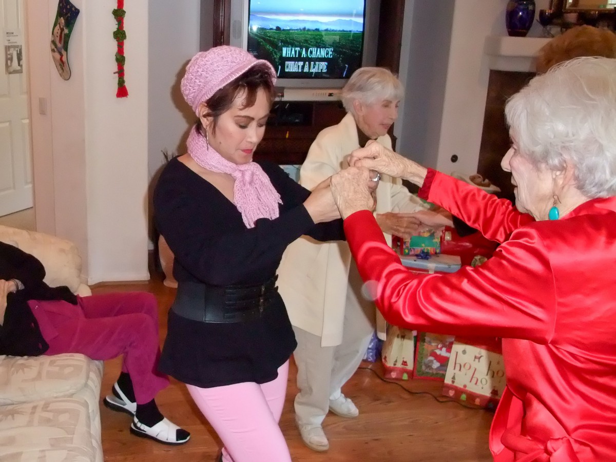 A lively group dancing at an indoor party.