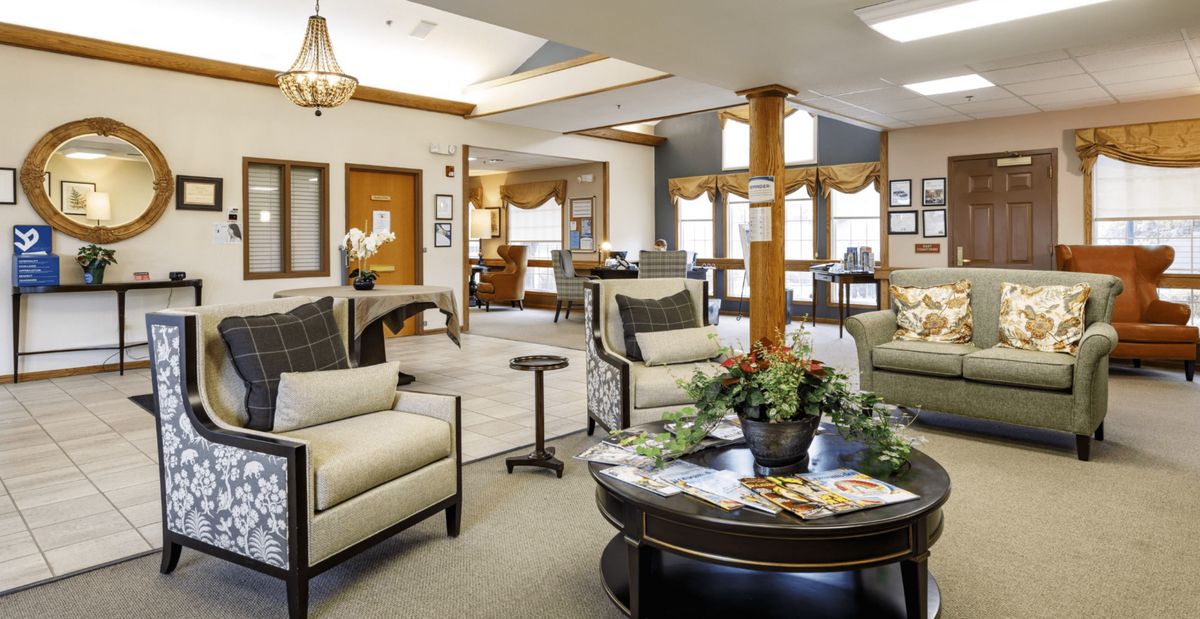 Spacious and elegantly decorated lobby with comfortable seating and warm lighting.