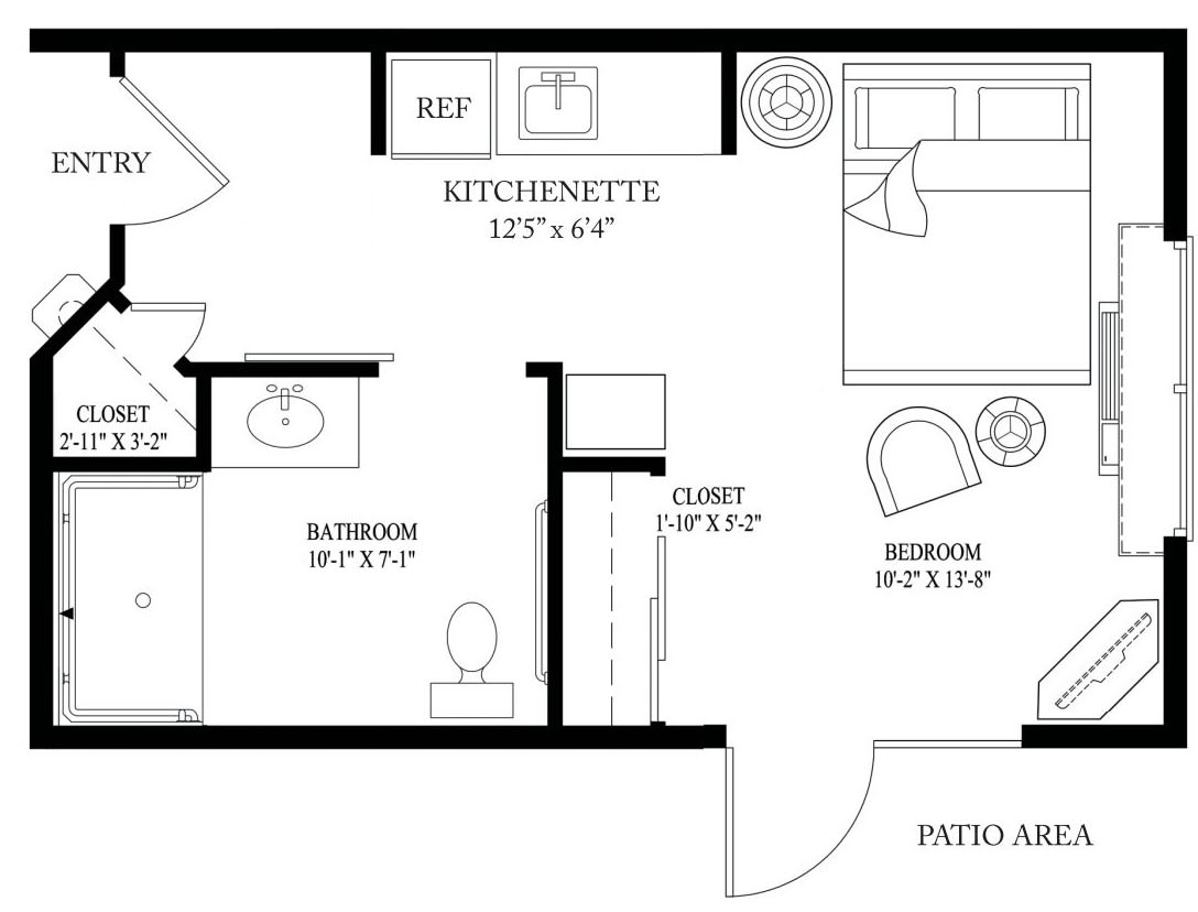 Studio apartment floor plan with a kitchenette, bathroom, and bedroom area.