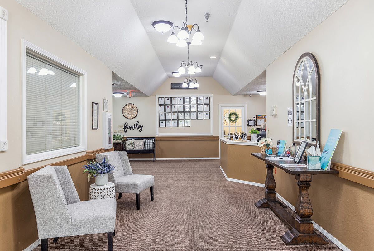 A well-lit reception area with comfortable seating and stylish decor.