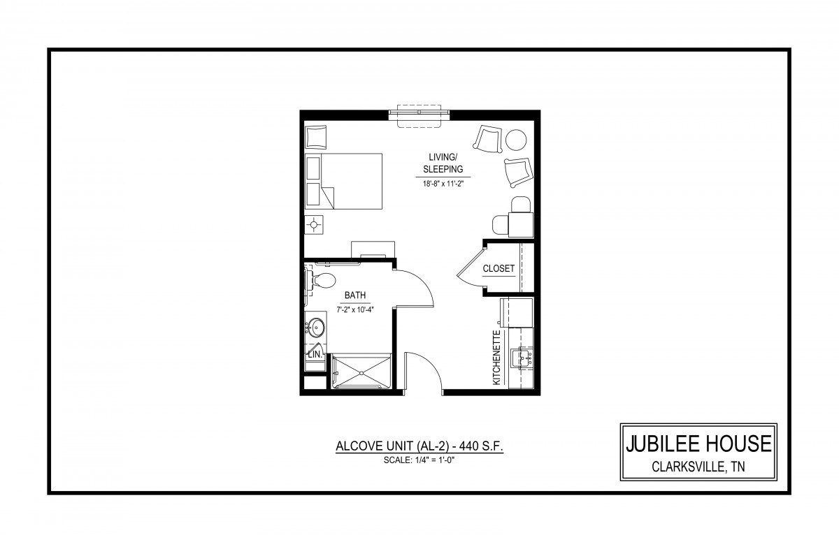 Floor plan of a studio apartment layout with living, sleeping, and kitchen areas.