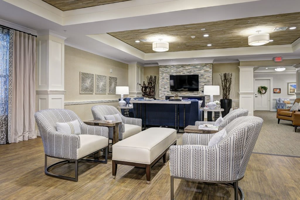 A modern living room with comfortable seating and stylish decorations.