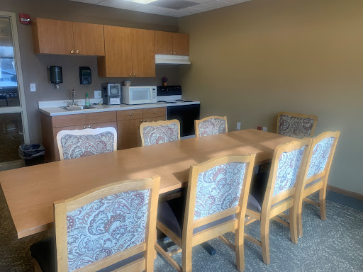 A cozy kitchen and dining area designed for casual meetings.