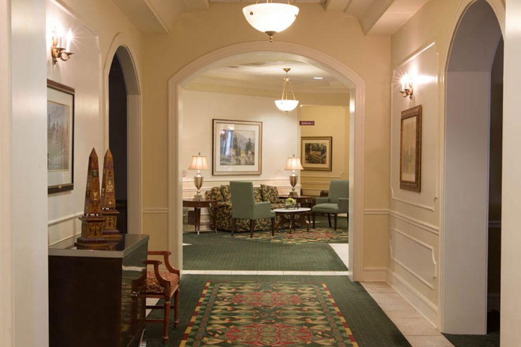 A well-appointed lobby area featuring elegant furniture and classic decor.