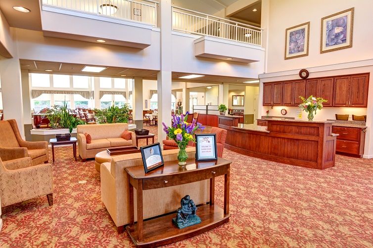 A spacious hotel lobby with comfortable seating and elegant decor.