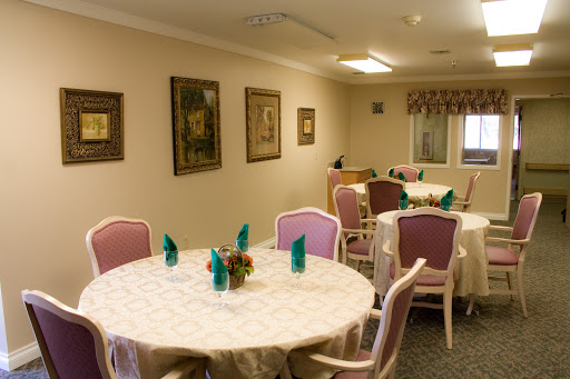 A cozy dining room featuring elegantly set tables and tasteful decor.