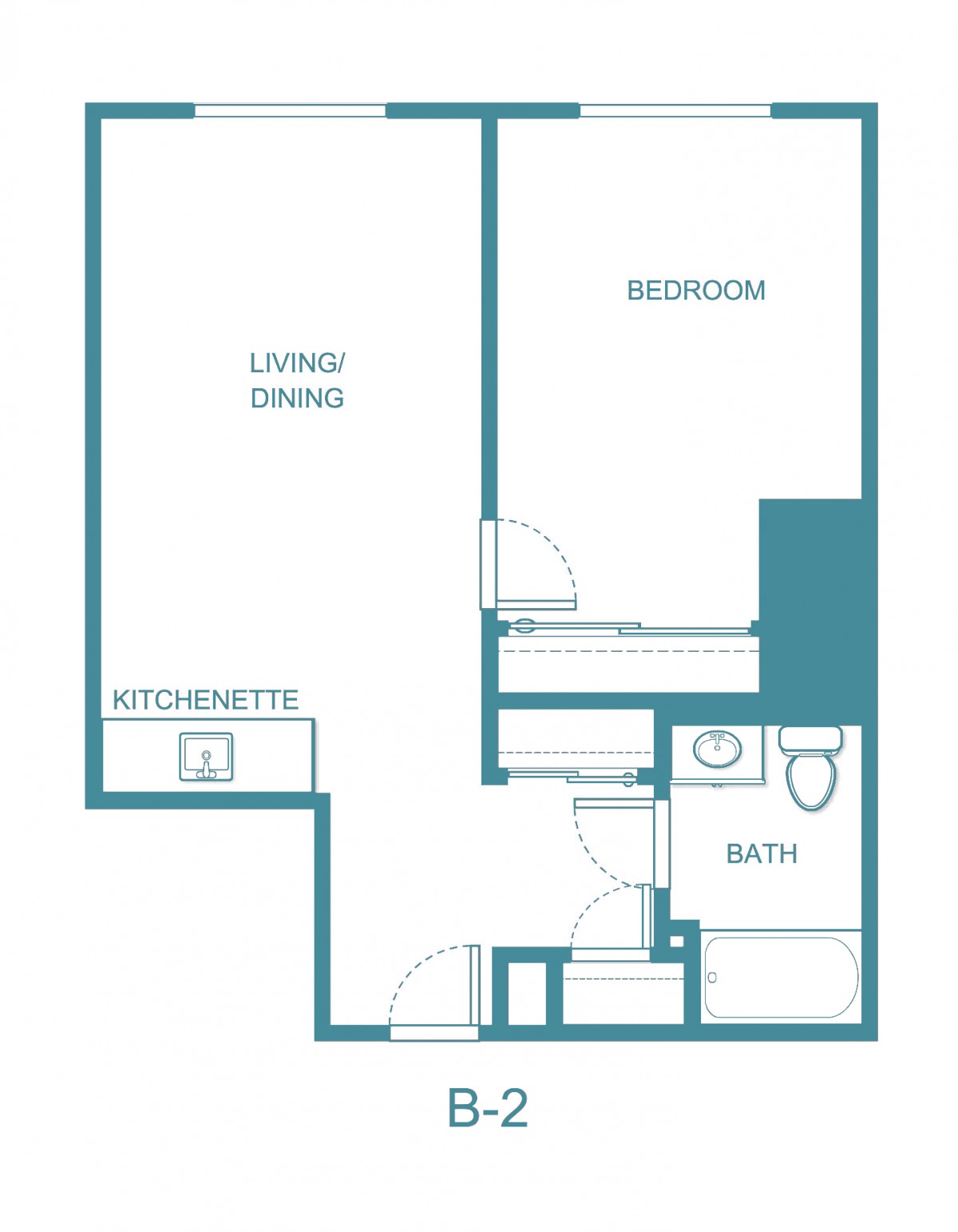 A floor plan of a one-bedroom apartment with a living/dining area, kitchenette, and bathroom.
