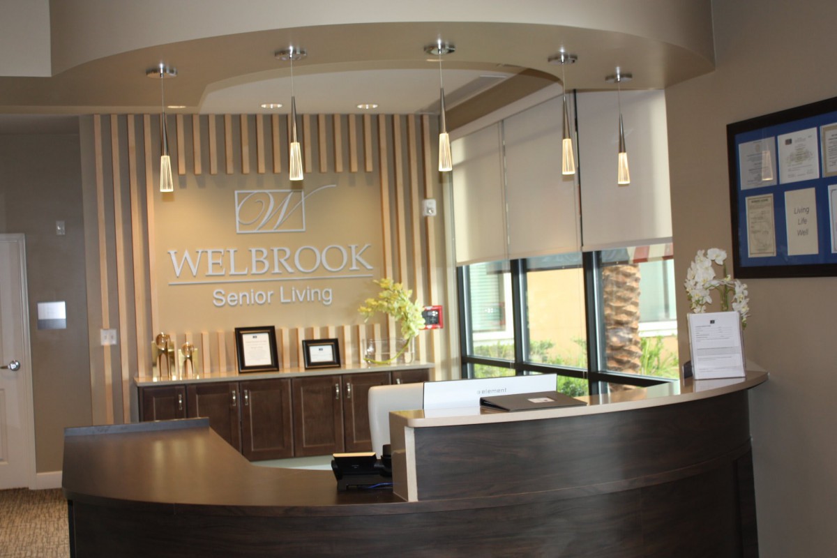 Modern office reception area with elegant lighting and decor.