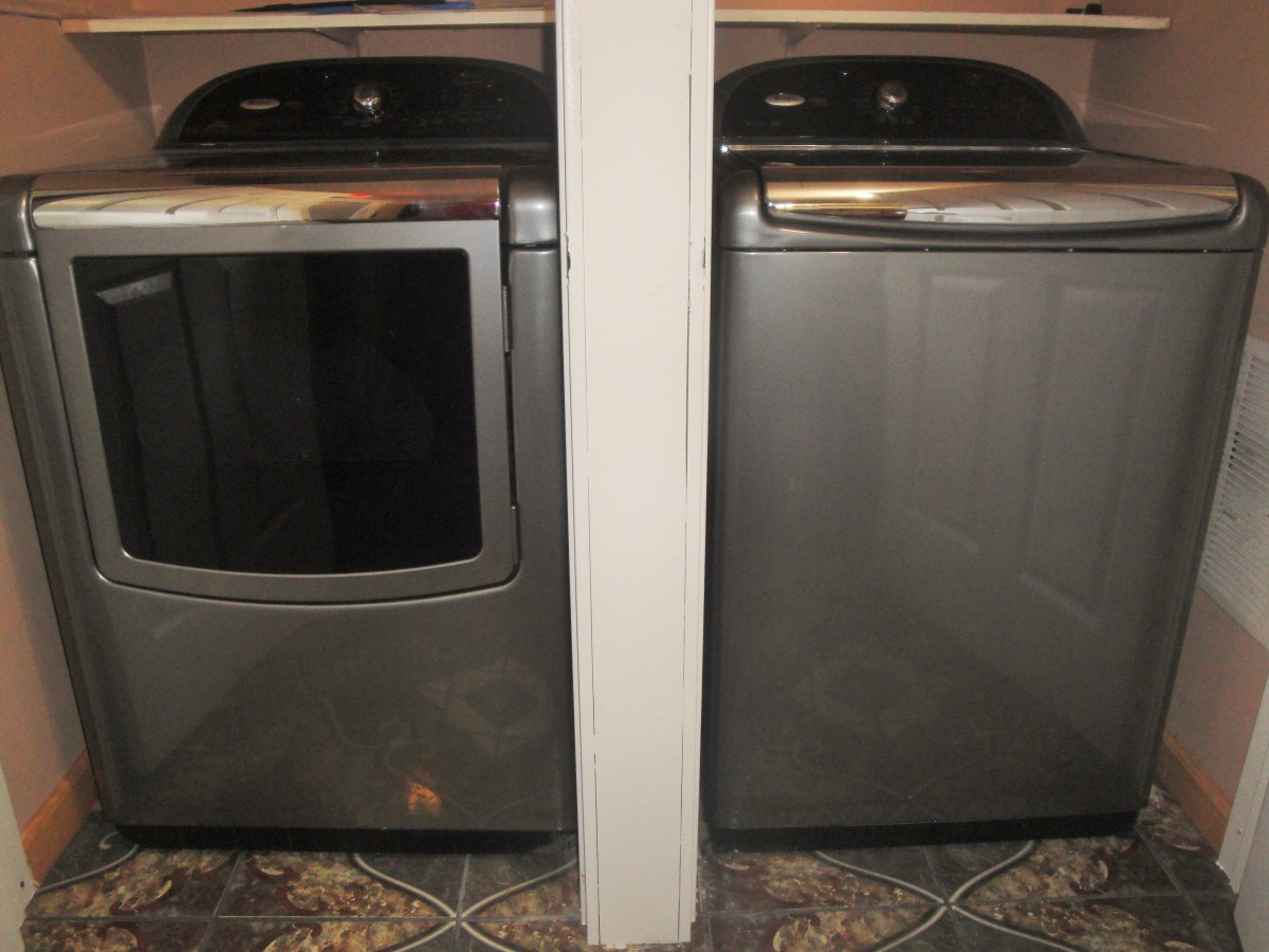 A washer and dryer set in a laundry room.