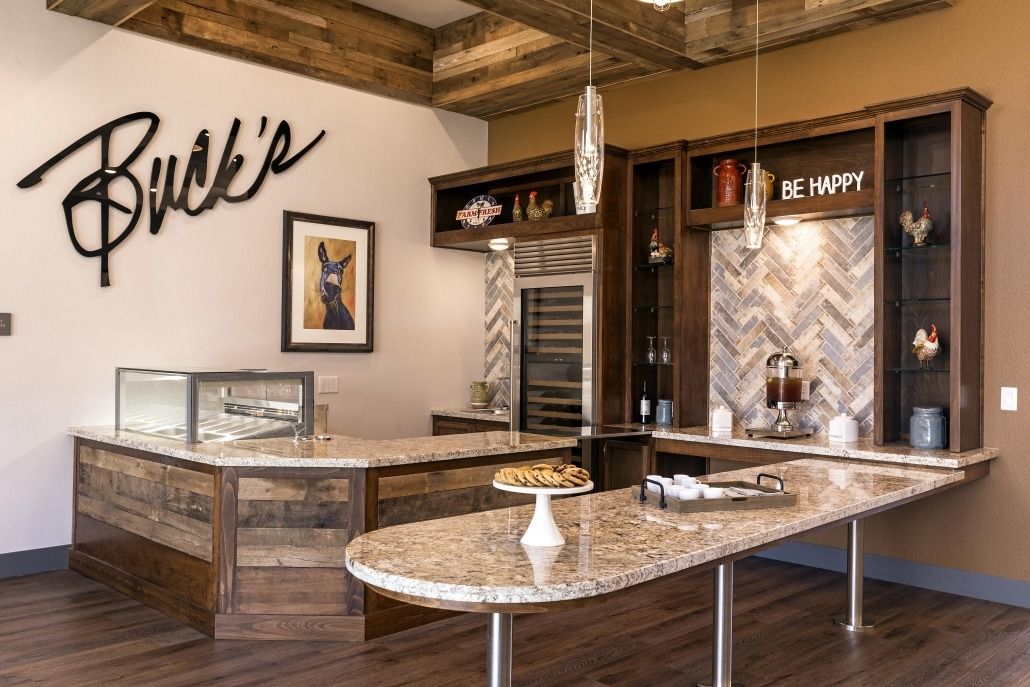 A modern kitchen interior with granite countertops and stylish decor.