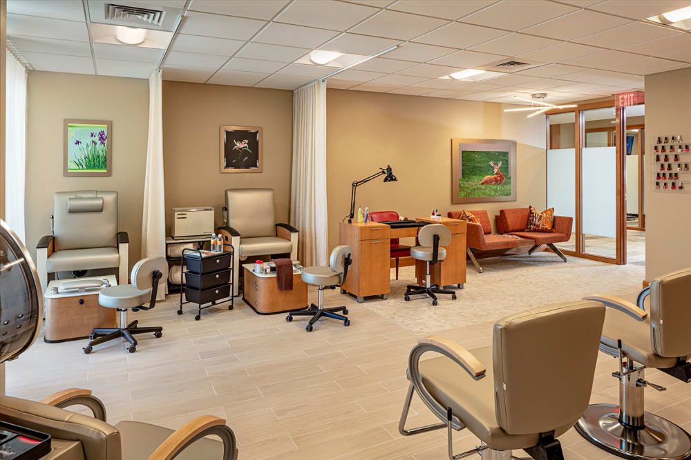 A modern waiting room with comfortable seating and stylish decor.
