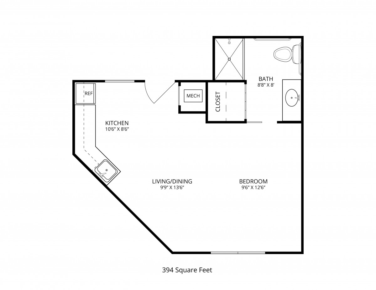 Studio apartment floor plan showing kitchen, living/sleeping area, and bathroom.